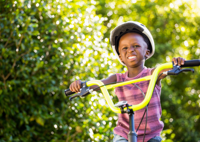 child riding a bike, occupational therapy, leisure activities, enriched movement, dublin ohio